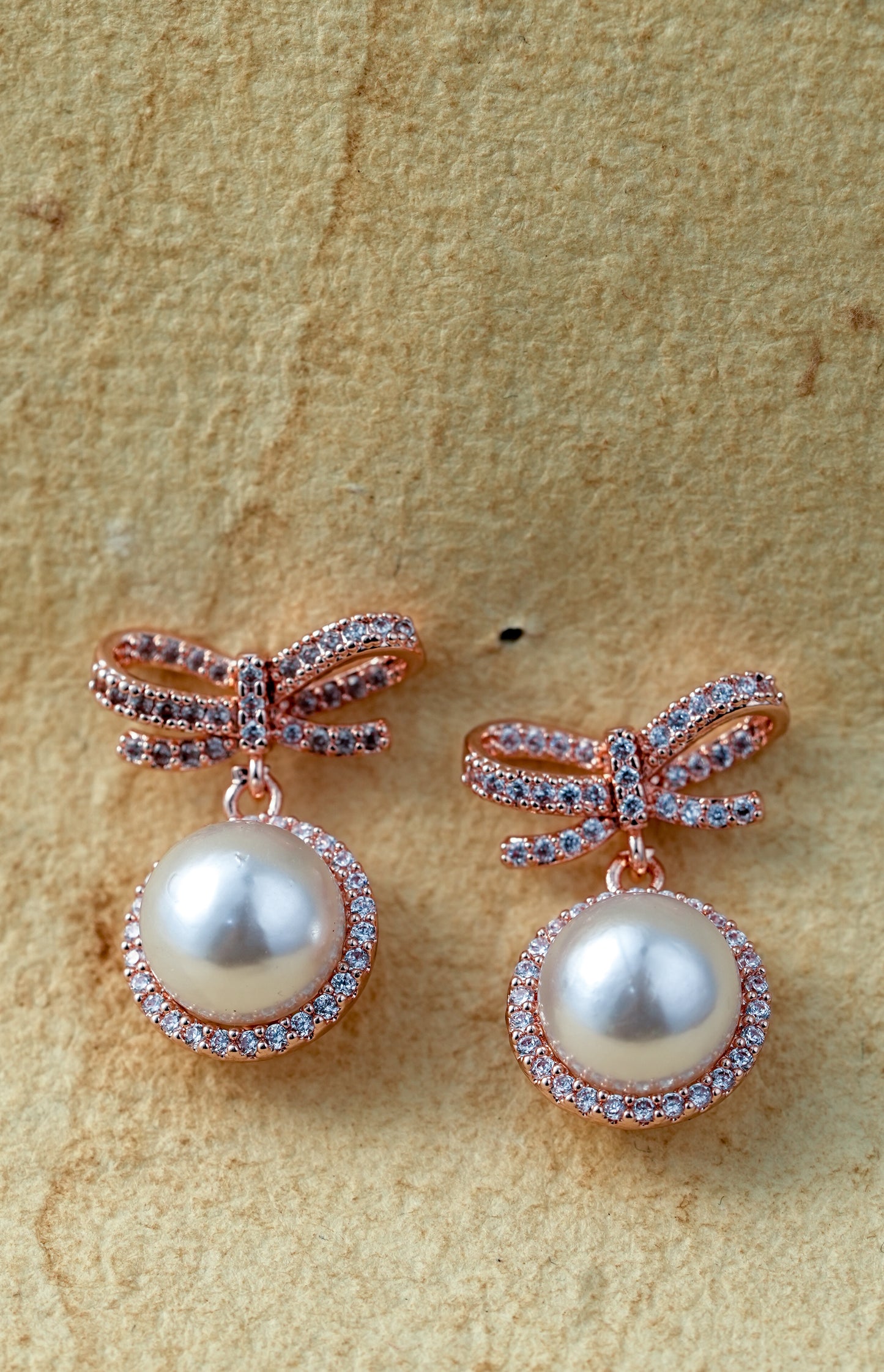 Rose Gold Bow Pearl Drop Earrings